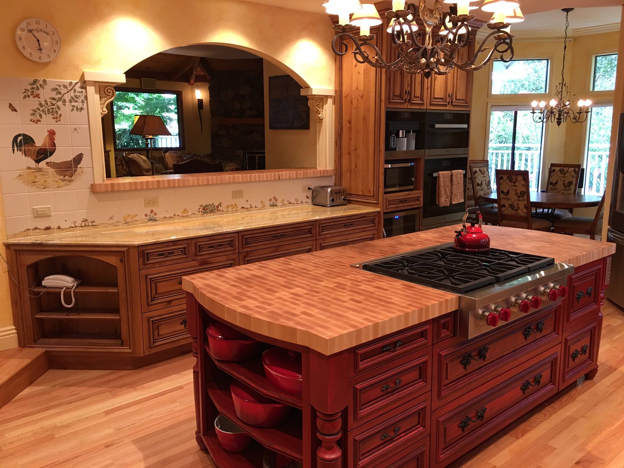 Custom Knotty Alder kitchen cabinetry and Island