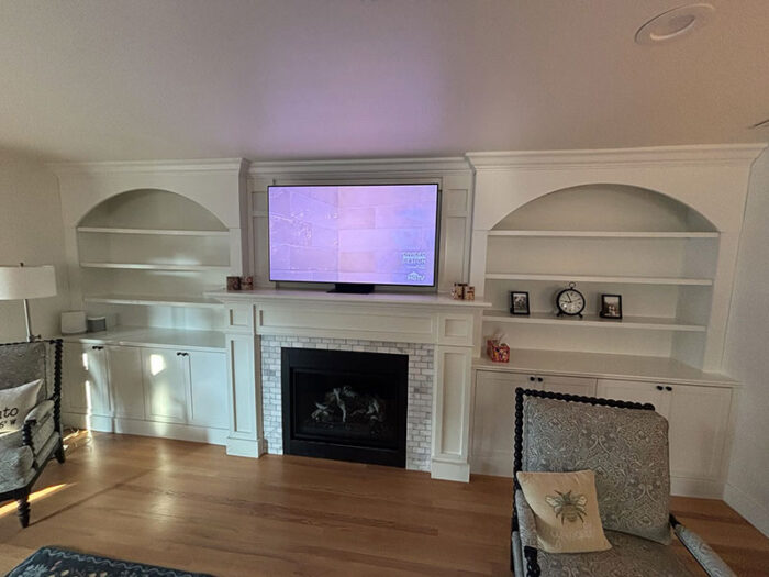 Family Room storage with Painted Shaker Doors and Floating Shelves